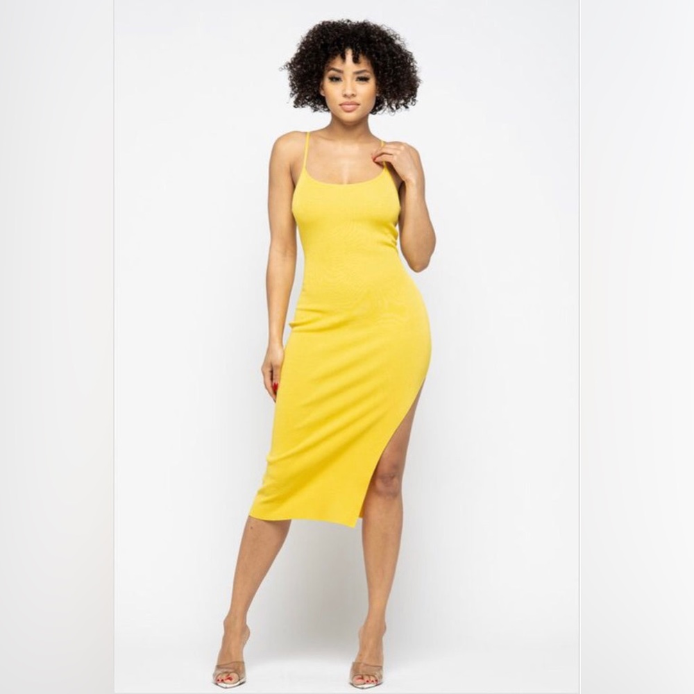 True to size with stretch. Model is wearing size small. Adjustable bra straps.